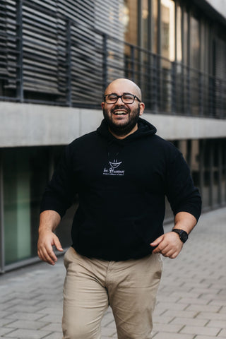 Hoodie Unisex, schwarz, mit '#DontForgetToSmile' Aufdruck in der Mitte